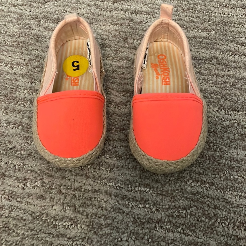Size 5 in little girl pink and orange flats. Worn a free times.